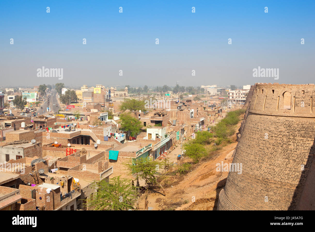 a view of hanumangarh city from the top of bhatner fort undergoing restoration work in rajasthan india under a blue sky in springtime Stock Photo