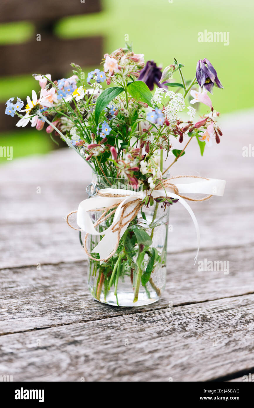 Celebration, outdoors, summer, flowers, bride, bridesmaid Stock Photo