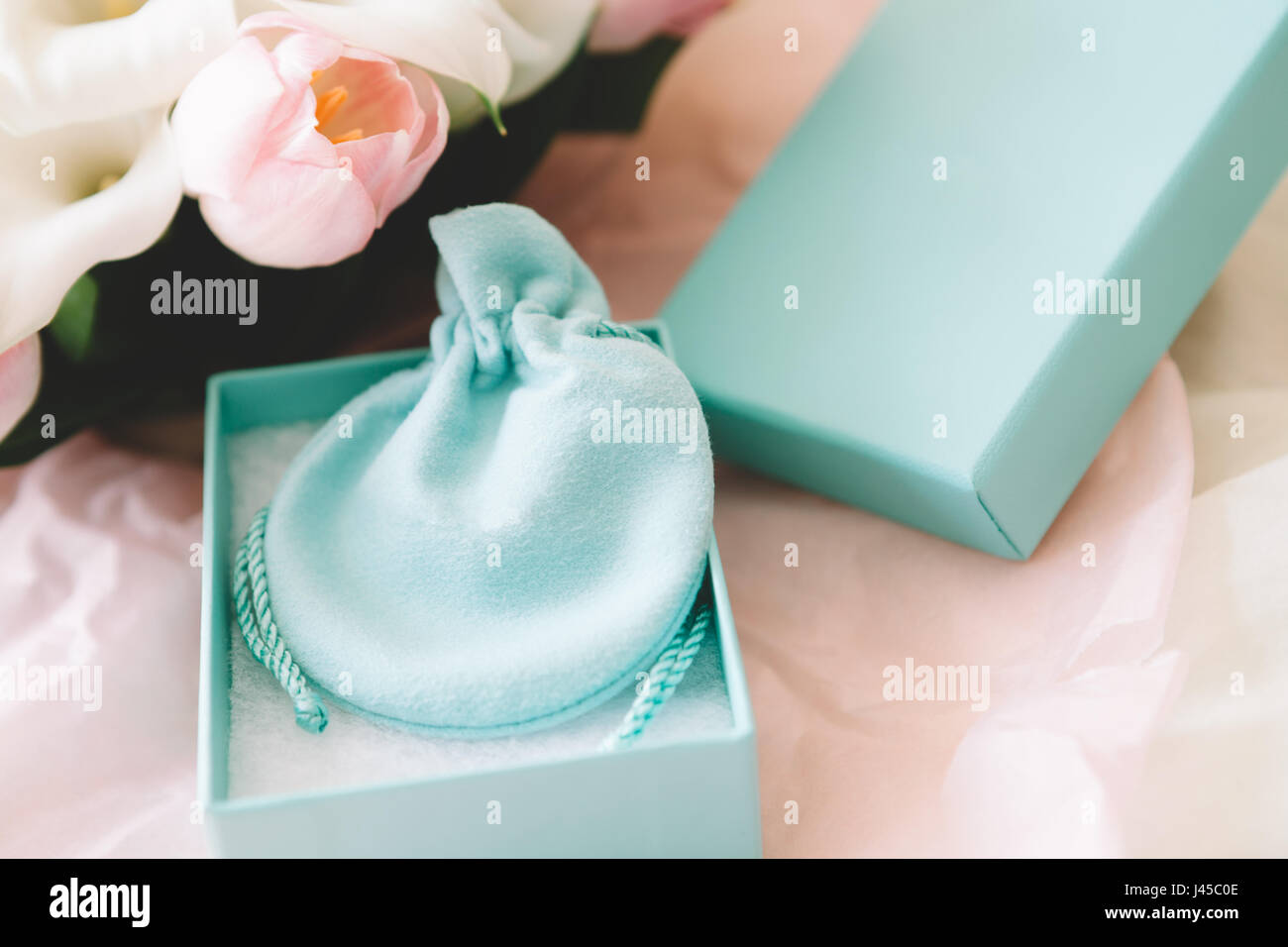 Pale blue jewellery box and bag Stock Photo