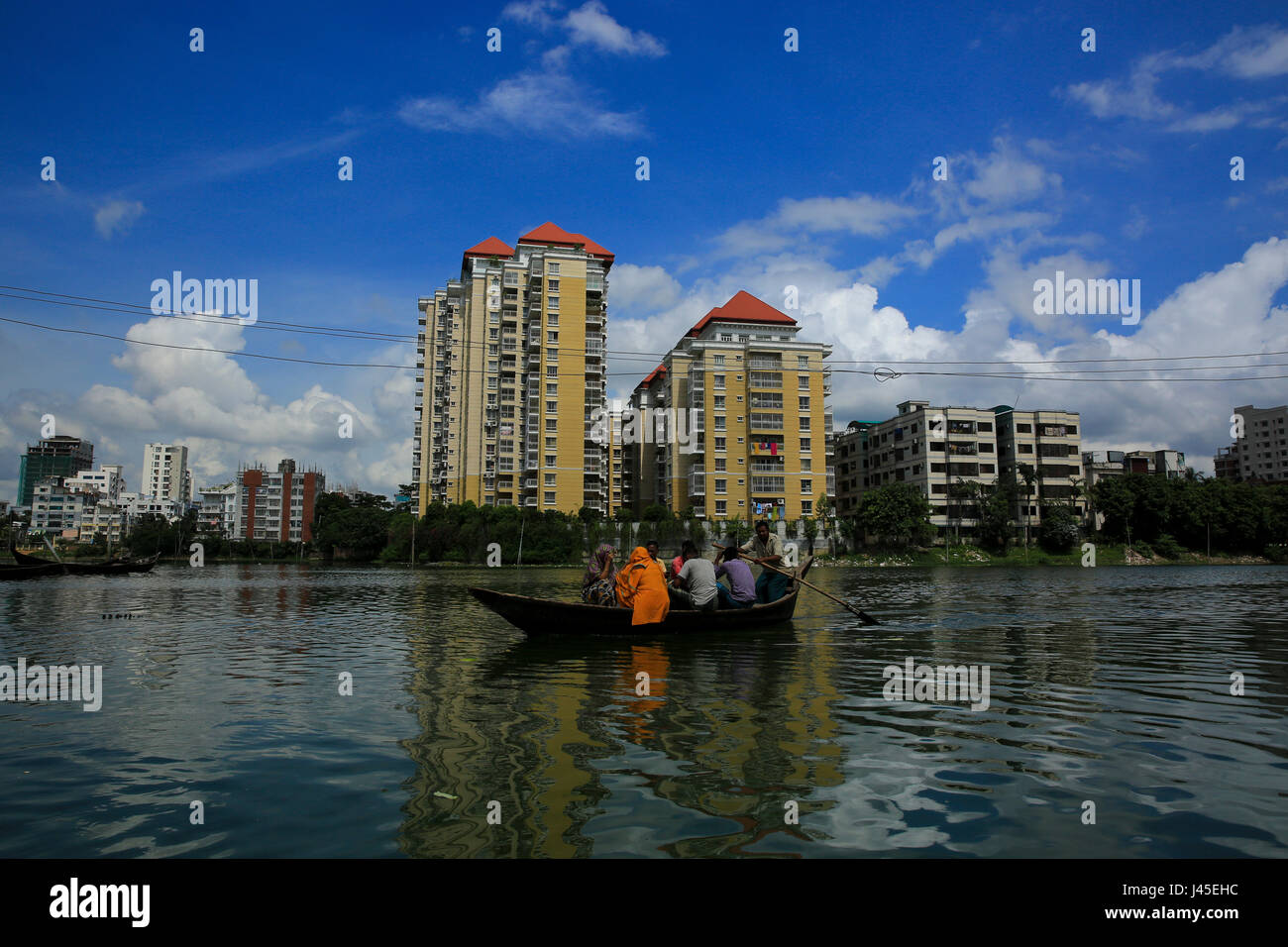 Dwellers of Korail Slum cross the Gulshan Lake. Dhaka, Bangladesh  Stock Photo