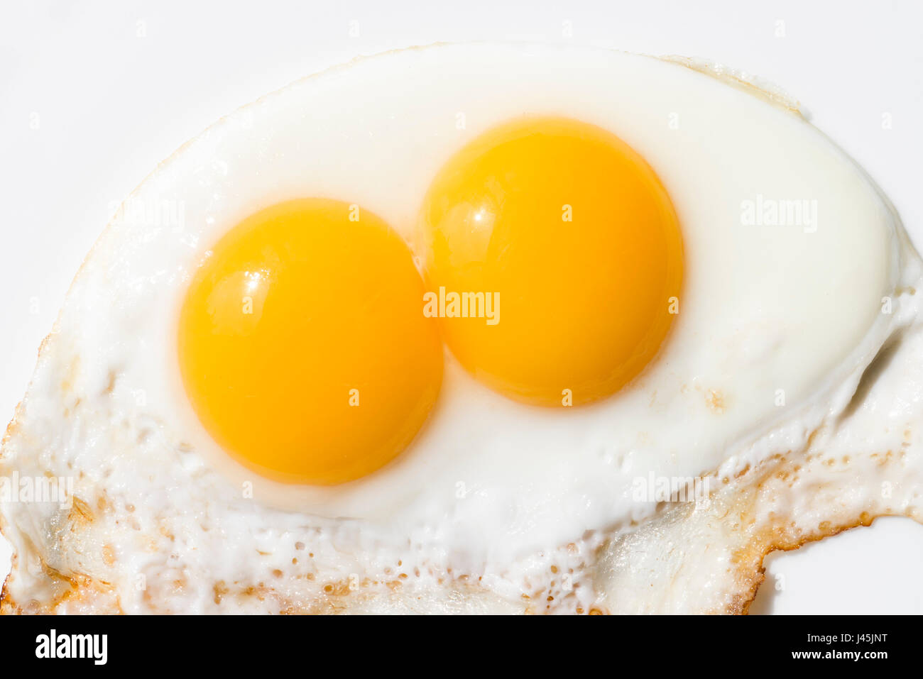 Double yolk Fried egg. Stock Photo