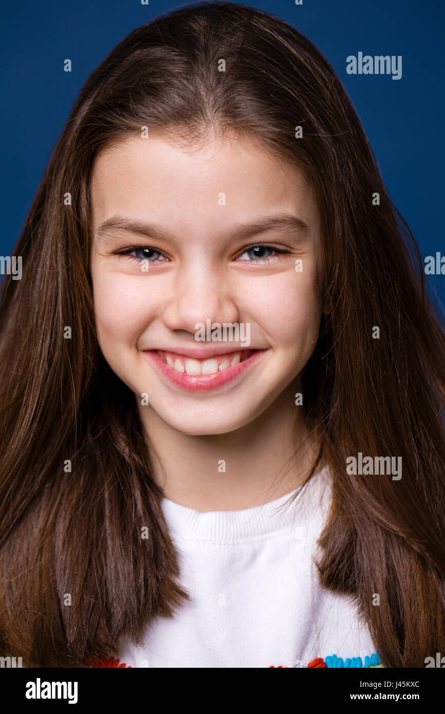 School age Indian girl posing, looking at the camera. 