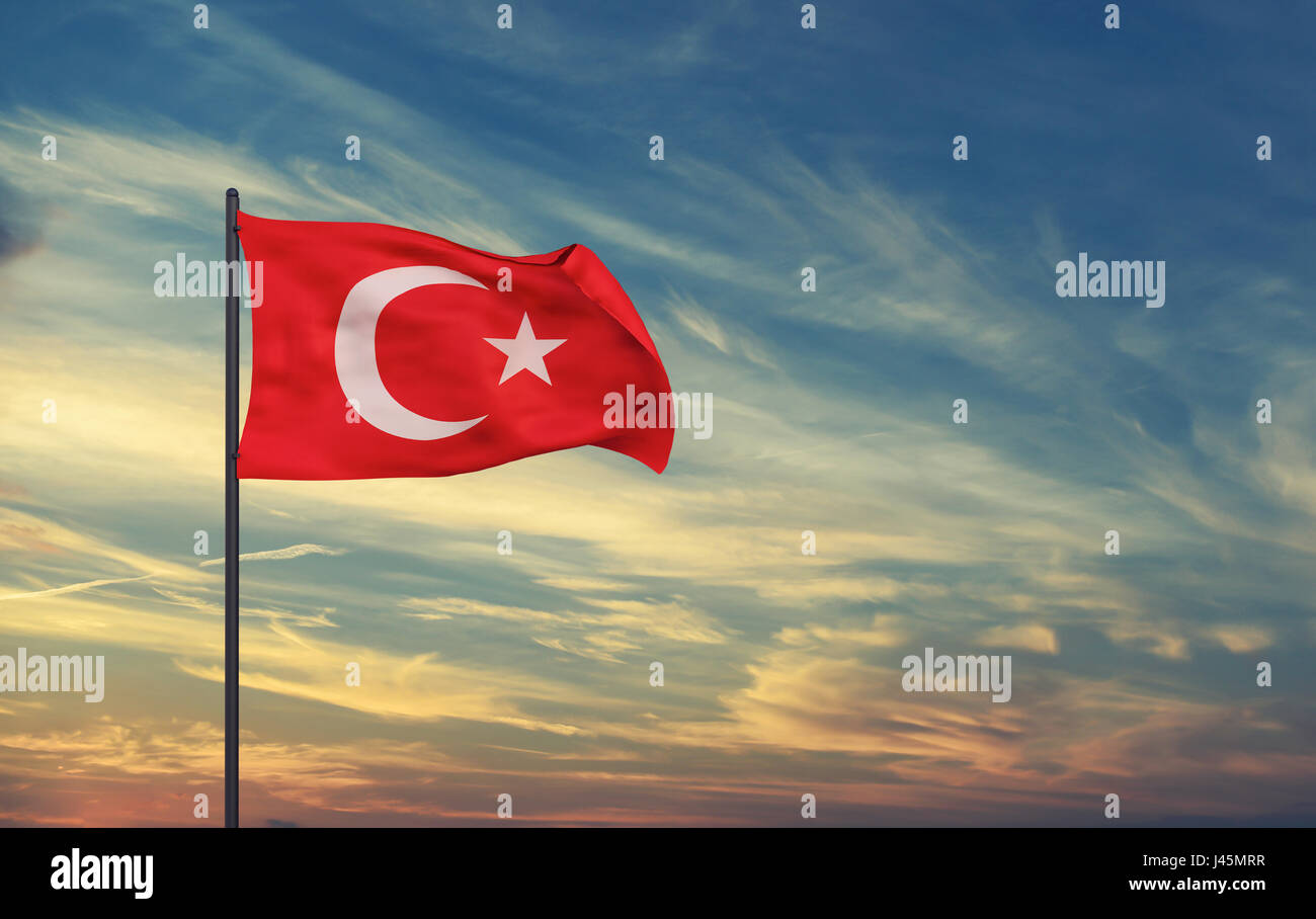 Turkish flag on the background of the sky. Stock Photo