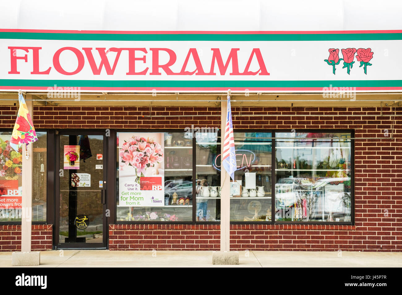 The exterior and entrance of a flower shop called Flowerama, in