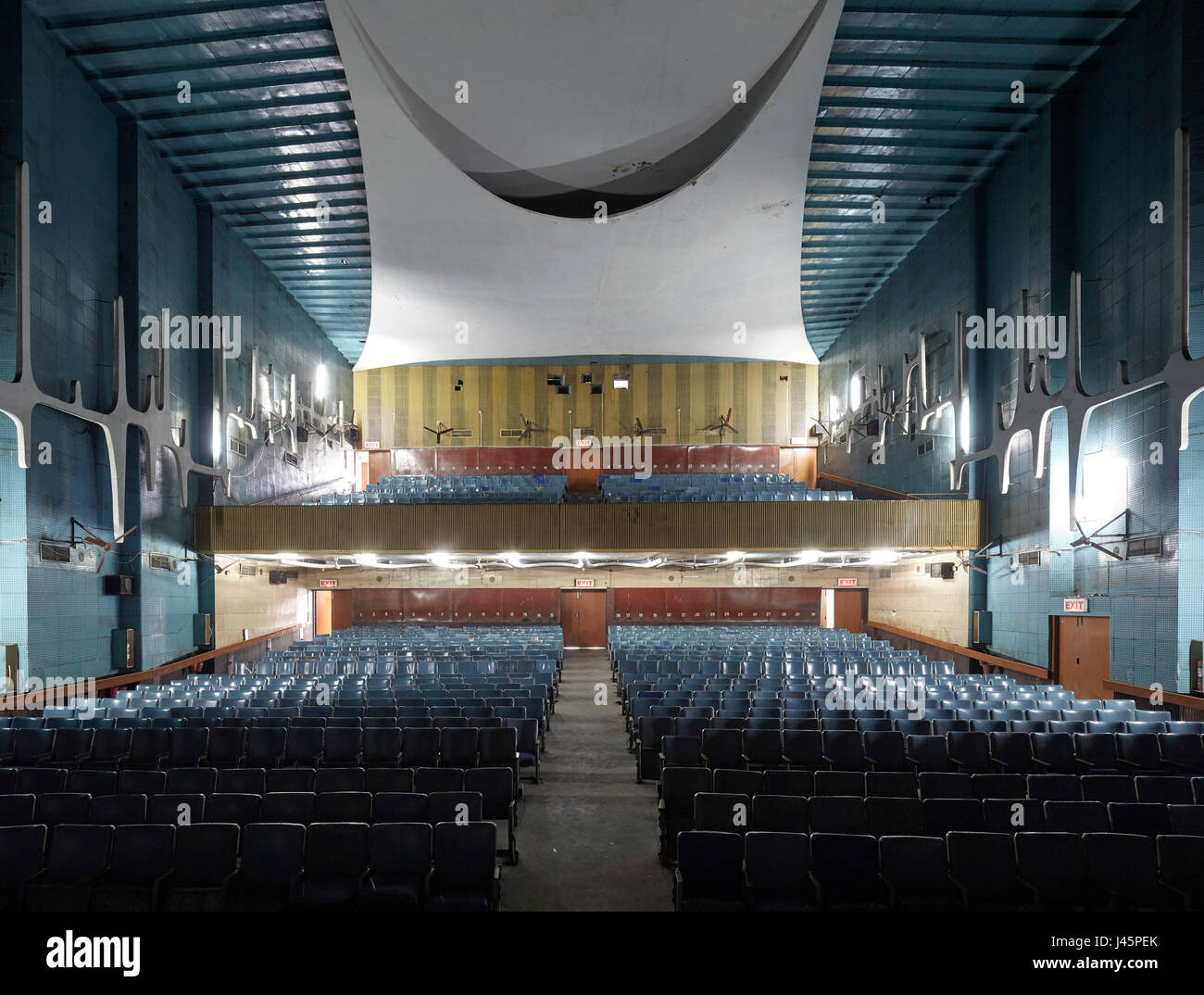 Overall cinema interior from stage. Neelam Cinema Chandigarh, Chandigarh, India. Architect: Le Corbusier, 1954. Stock Photo