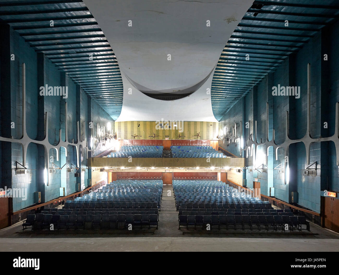 Overall cinema interior from stage. Neelam Cinema Chandigarh, Chandigarh, India. Architect: Le Corbusier, 1954. Stock Photo