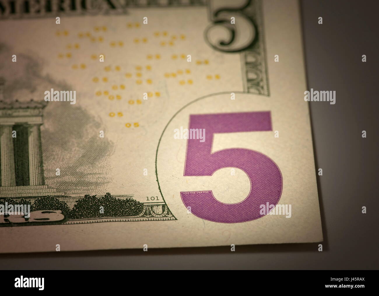 number 5 on the dollar bill macro shot Stock Photo