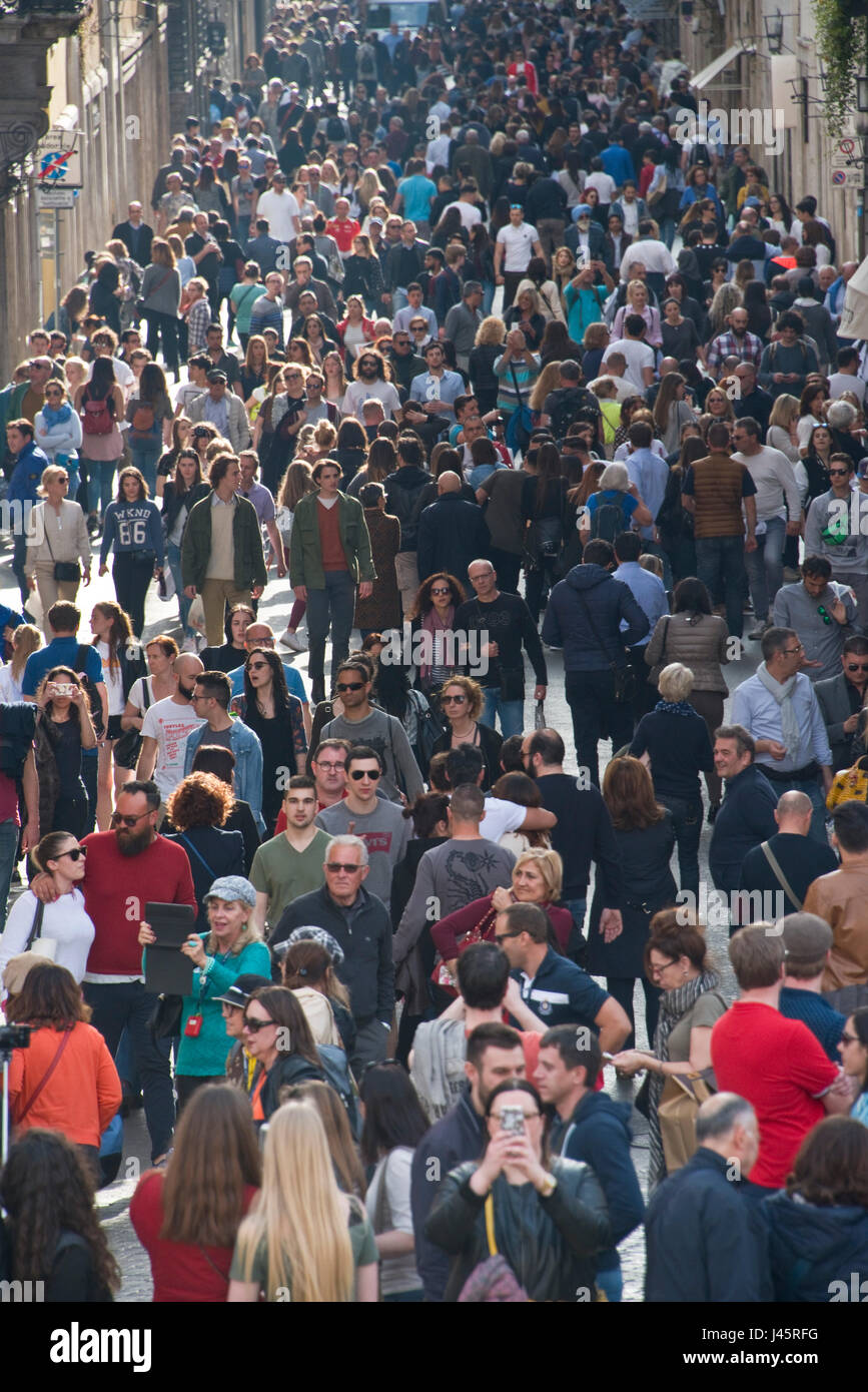 Crowds of people, tourists, visitors to Rome near the Spanish Steps showing the congestion that can occur. Stock Photo