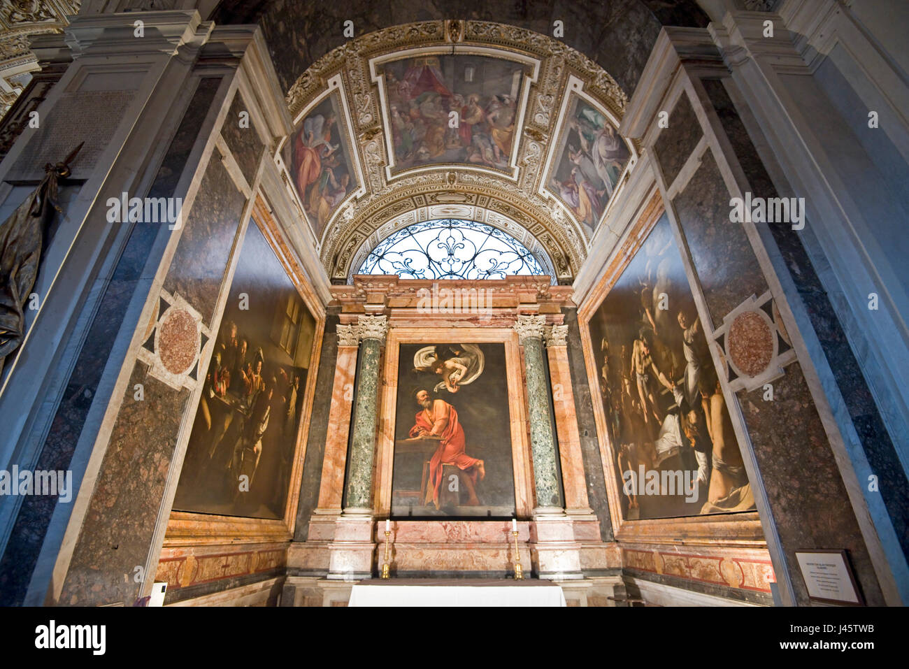 Paintings by Caravaggio in the San Luigi dei Francesi church in Rome. Stock Photo