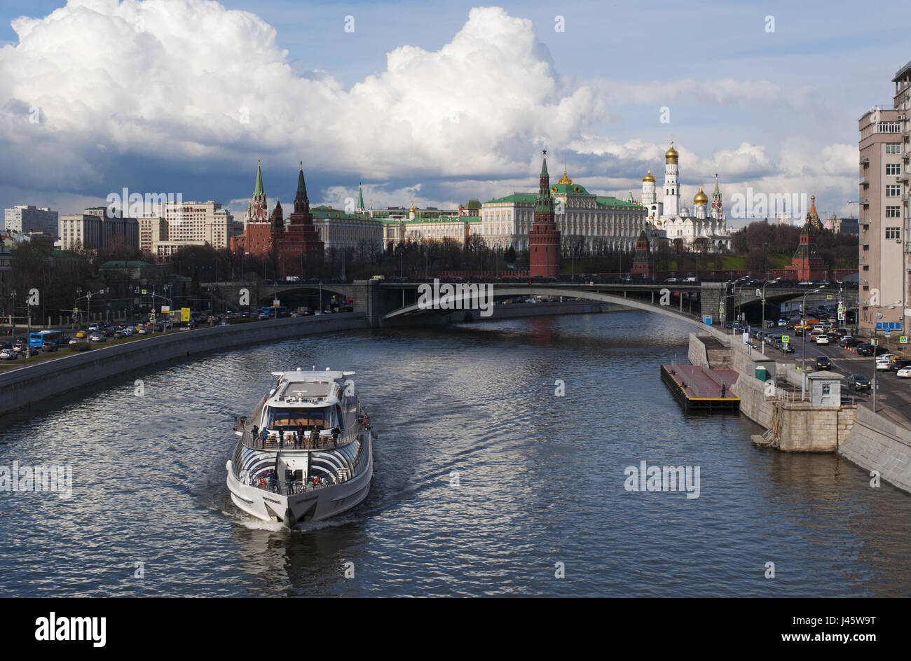 A cruise on the Moskva River, skyline of Moscow with view of the fortified complex of the Kremlin and Bolshoy Kamenny Bridge (Greater Stone Bridge) Stock Photo