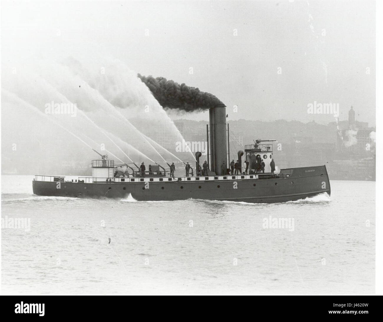 Originally the Seattle fireboat Duwamish was built with a 'ram' bow Stock Photo