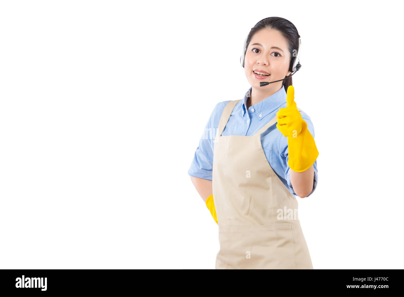 happy teeth smile pretty profession girl showing thumbs up for professional house cleaning online services. isolated on white background. mixed race a Stock Photo