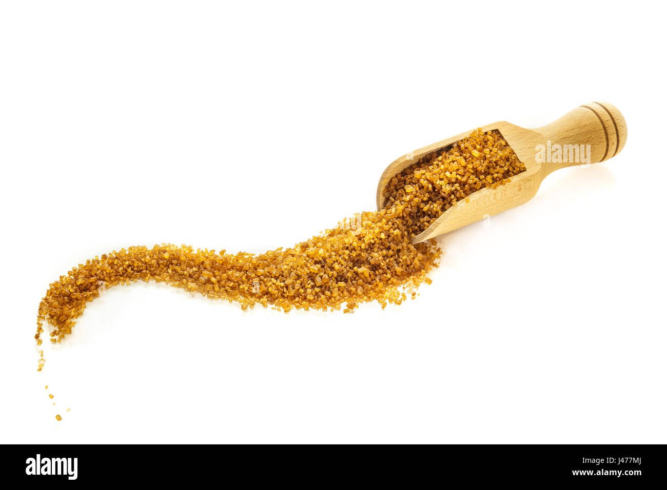 Scoop of brown sugar on white with copyspace Stock Photo Alamy