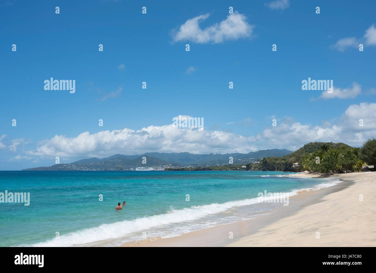 Swiimers in the sea on Magazin Beach in southwest Grenada, West Indies, Caribbean Stock Photo