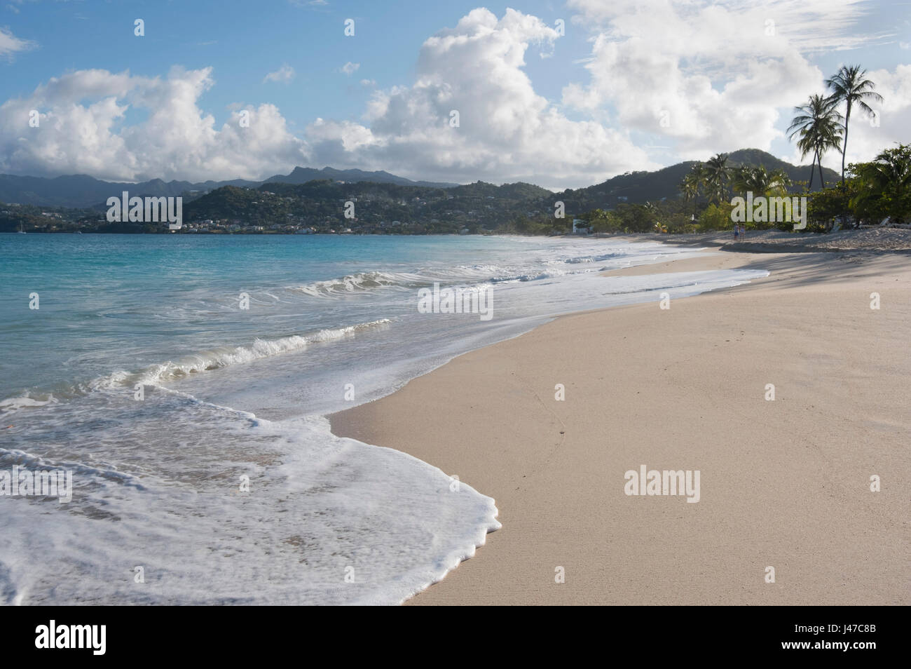 Surf on Grand Anse Beach and the view toward the coast around St. George's, Grenada, West Indies, The Caribbean. Stock Photo