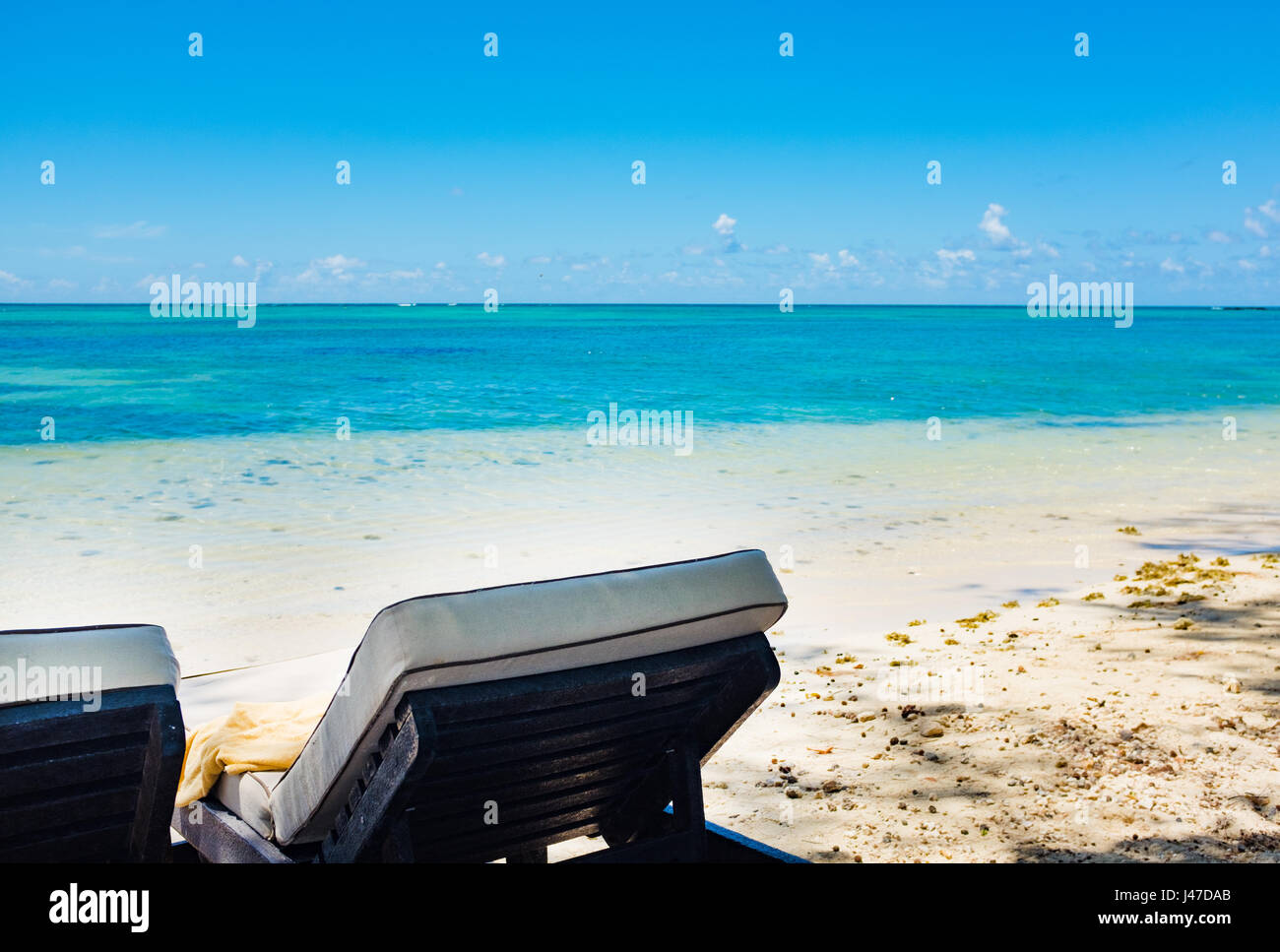 empty deckchairs on the beach . Mauritius island Stock Photo