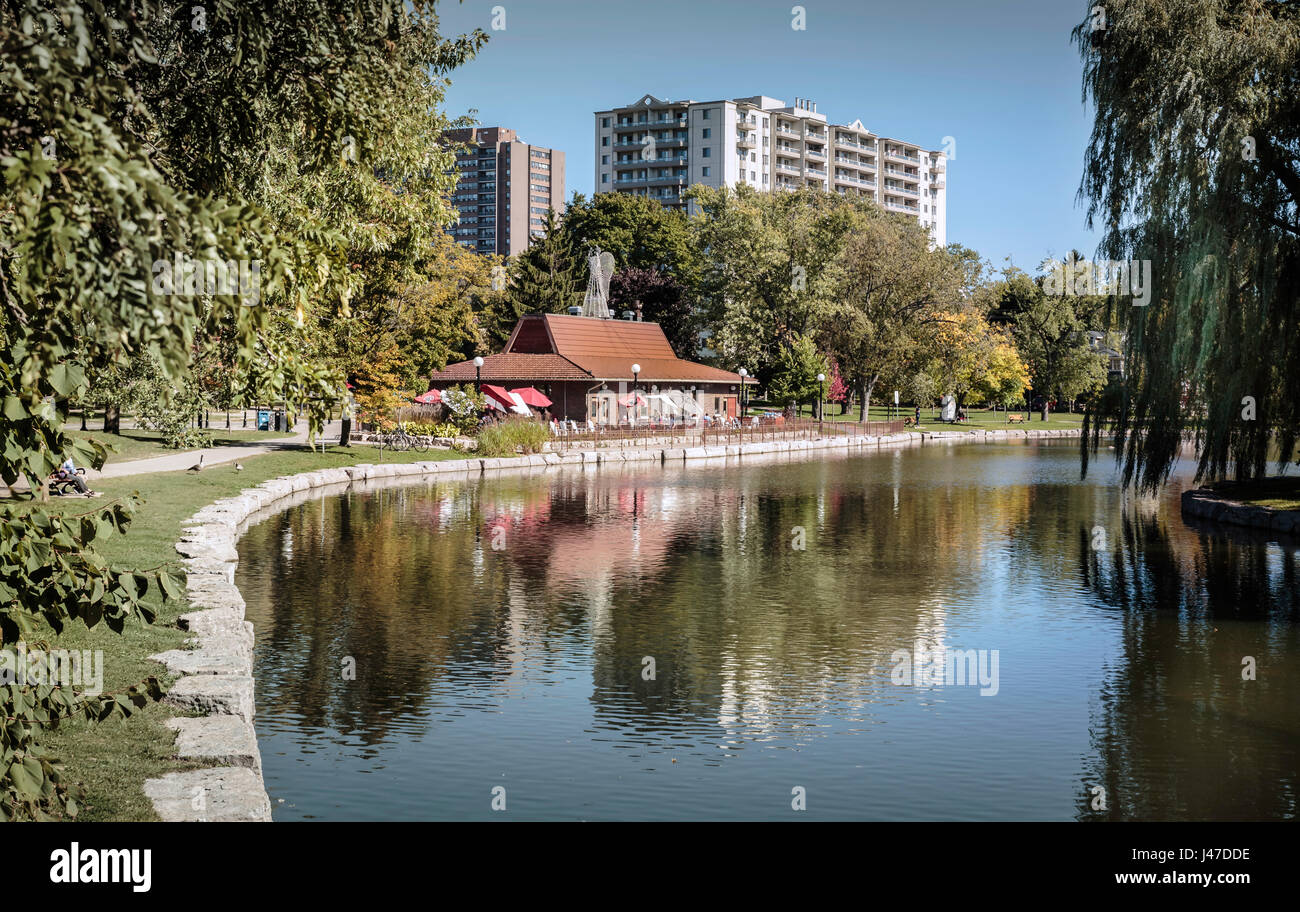Victoria Park Lake spans nearly 60 acres in the downtown core of Kitchener Ontario, Canada Stock Photo