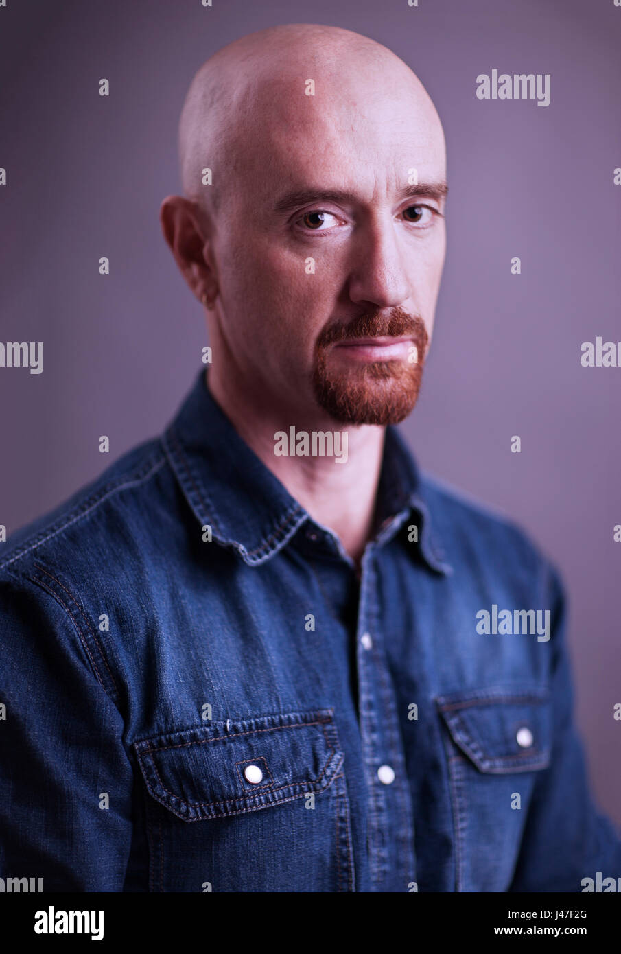 Portrait Of A Sad And Angry Looking Bald Man With A Red Goatee Stock Photo Alamy