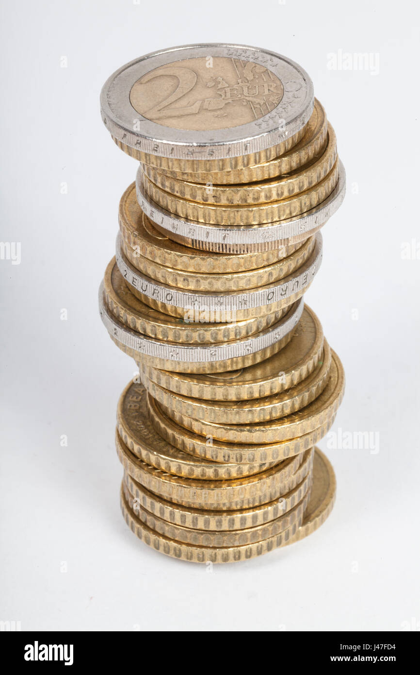Wobbly stack with euro coins Stock Photo