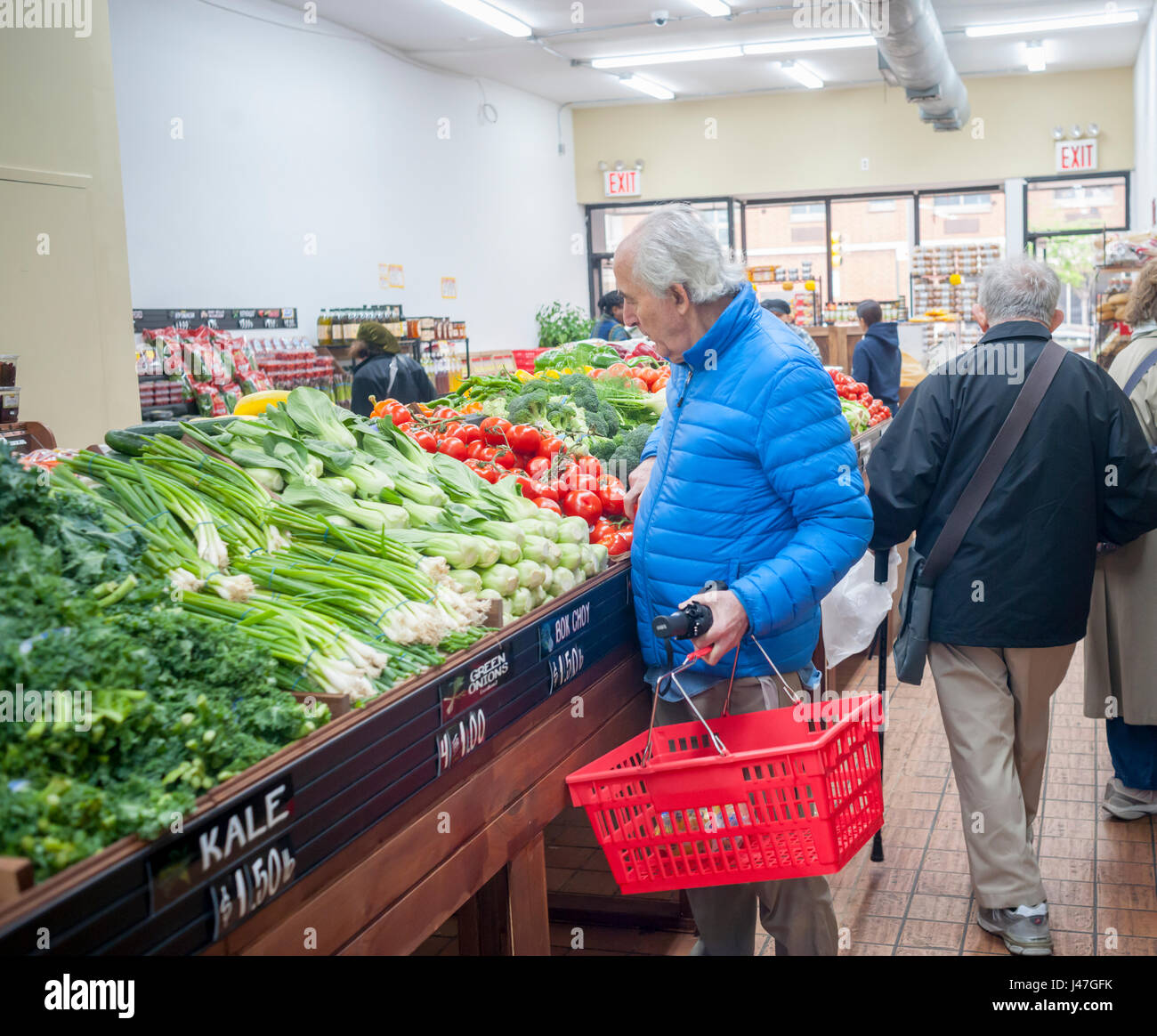 Shoppers at the newly reopened Stile's Farmers Market in the Hell's ...