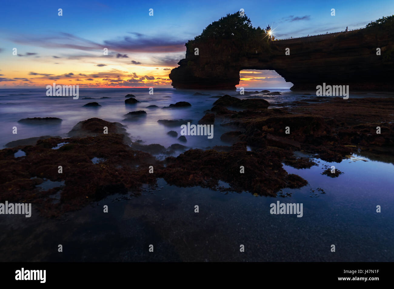 Tanah Lot Temple at sunset in Bali, Indonesia. Sunset at Bali's famous ...