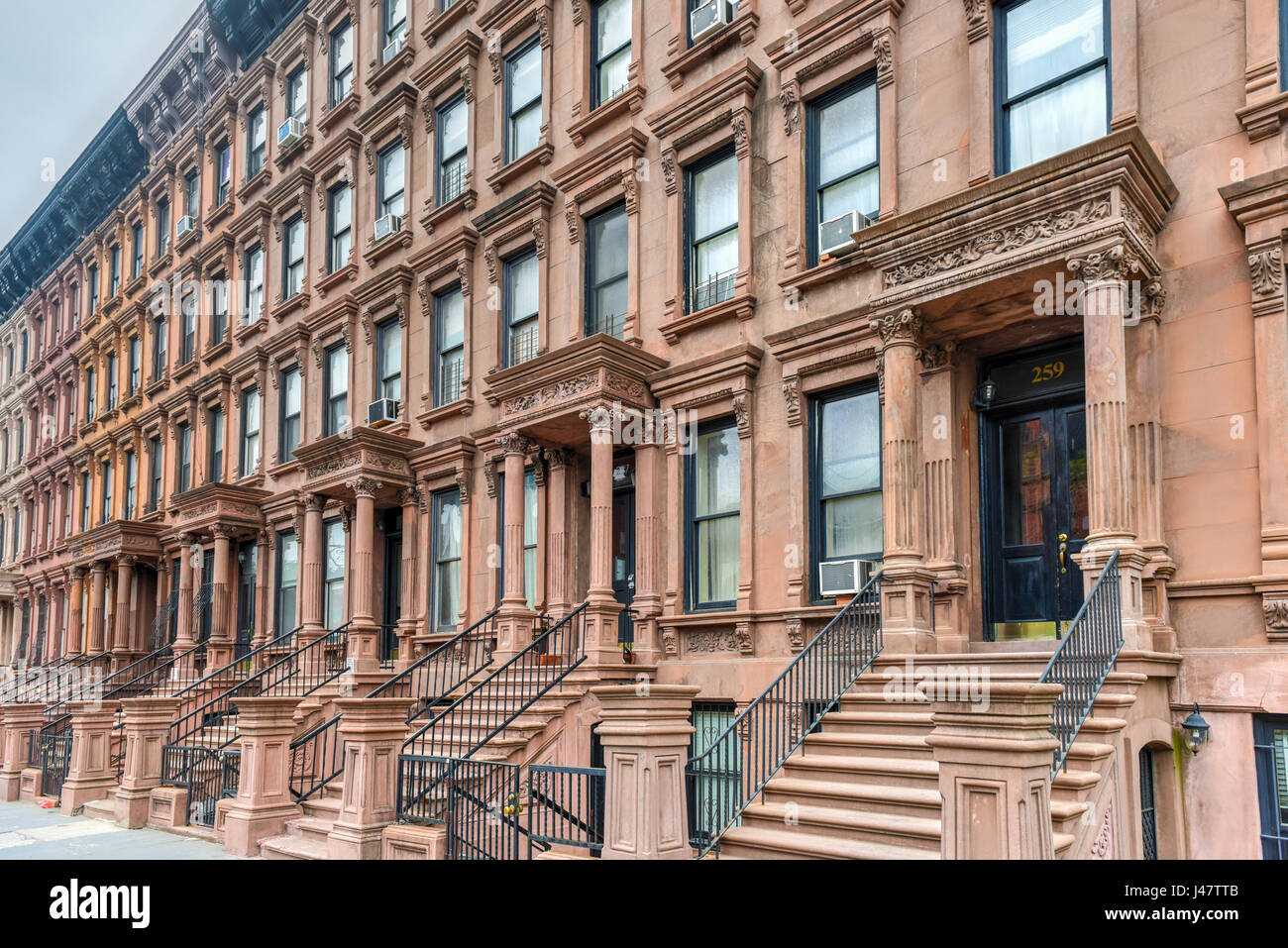 Brownstones in the Harlem Neighborhood of New York City Stock Photo - Alamy, image size:1300x957