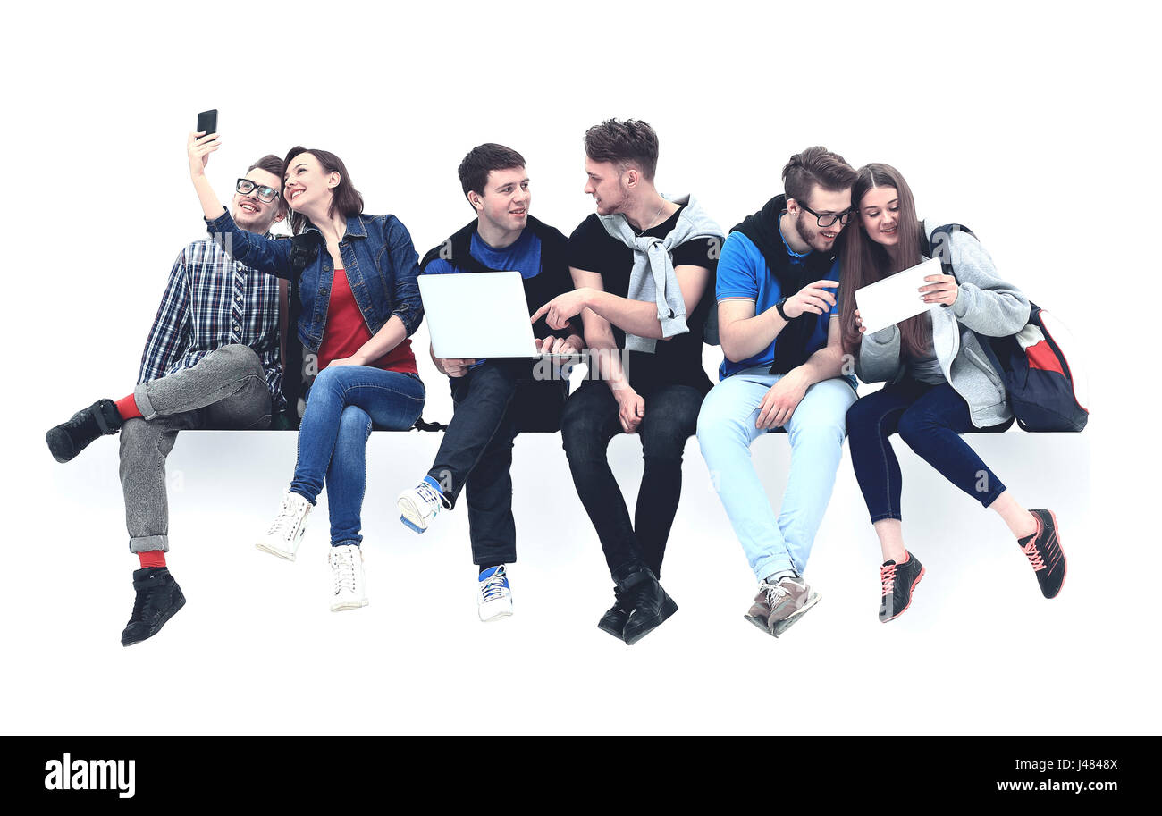 Causal group of people sitting on the floor isolated Stock Photo