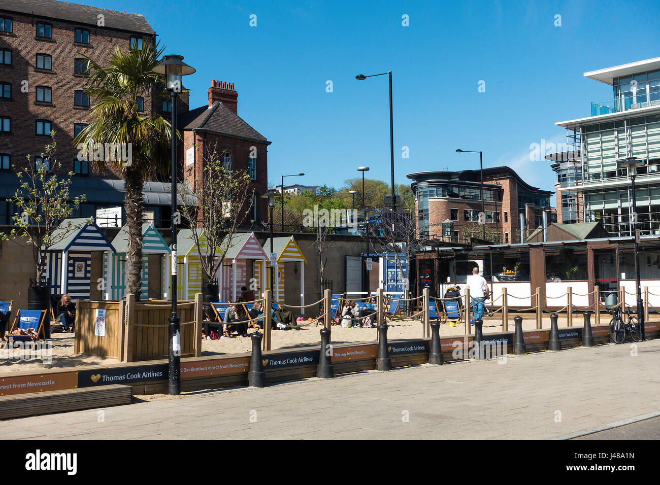 The Quayside Seaside Area on the River Bank at Newcastle upon Tyne with Sand Beach Huts and Deckchairs Tyne and Wear England United Kingdom UK Stock Photo