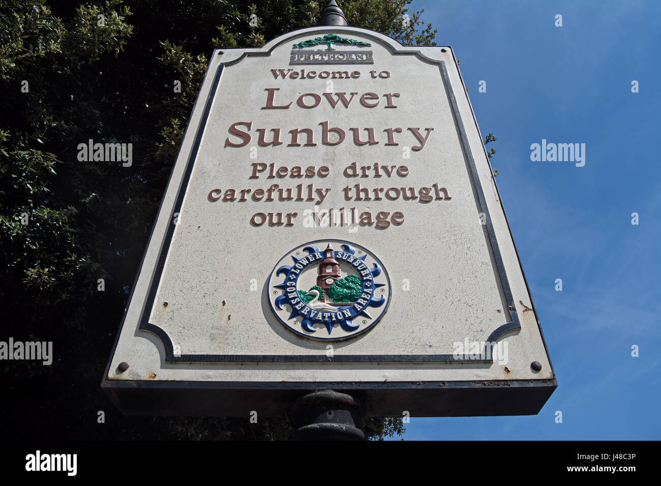 welcome to lower sunbury sign, with please drive carefully message, lower sunbury, middlesex, england Stock Photo