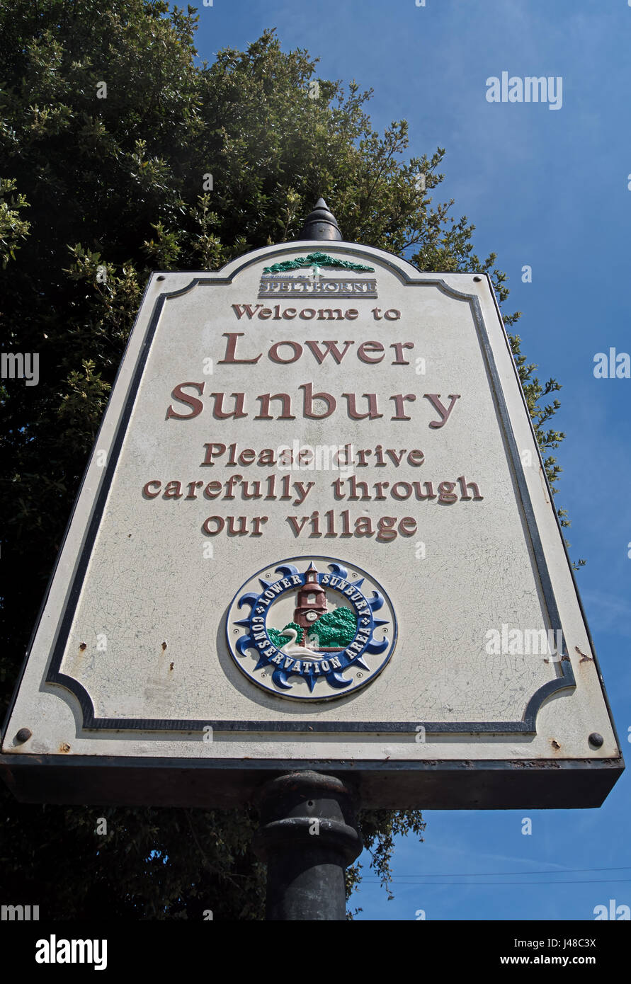 welcome to lower sunbury sign, with please drive carefully message, lower sunbury, middlesex, england Stock Photo