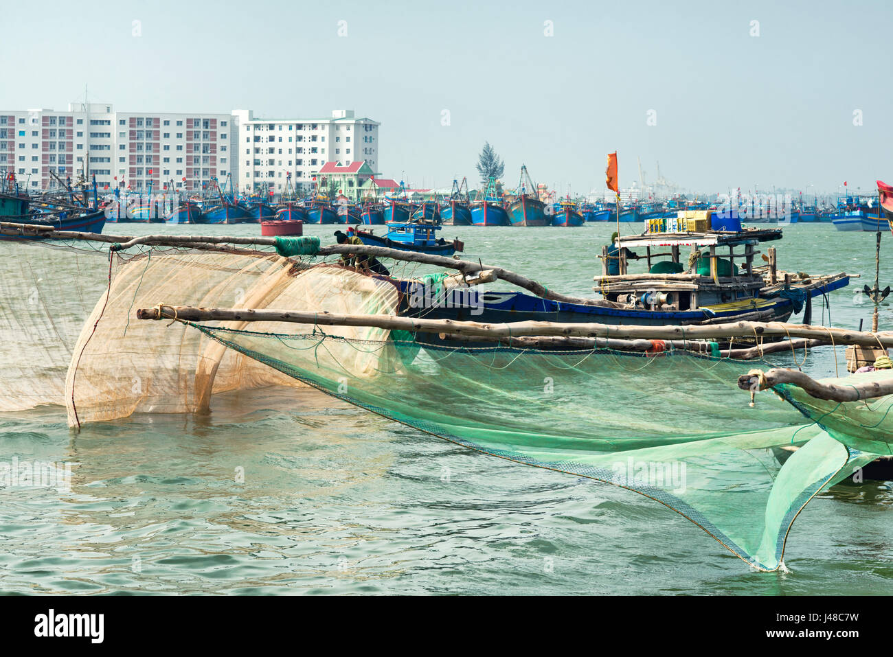 Wooden boats with large fishing nets in Da Nang, Vietnam Stock Photo - Alamy