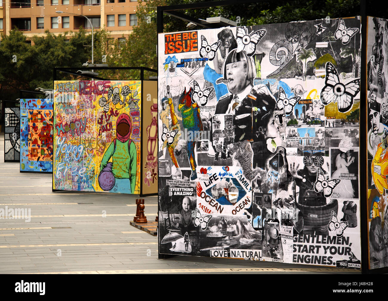 Several display boards showing montages of photographs and artwork Stock Photo