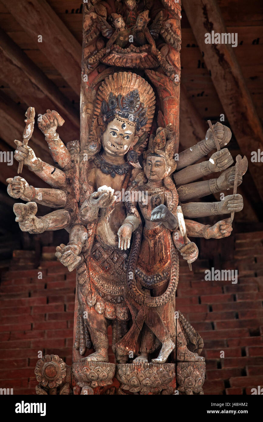 The many armed Hindu goddess - Kali - a wooden carving on the Vishwanath Temple, Patan Durbar Square, Kathmandu Nepal Stock Photo