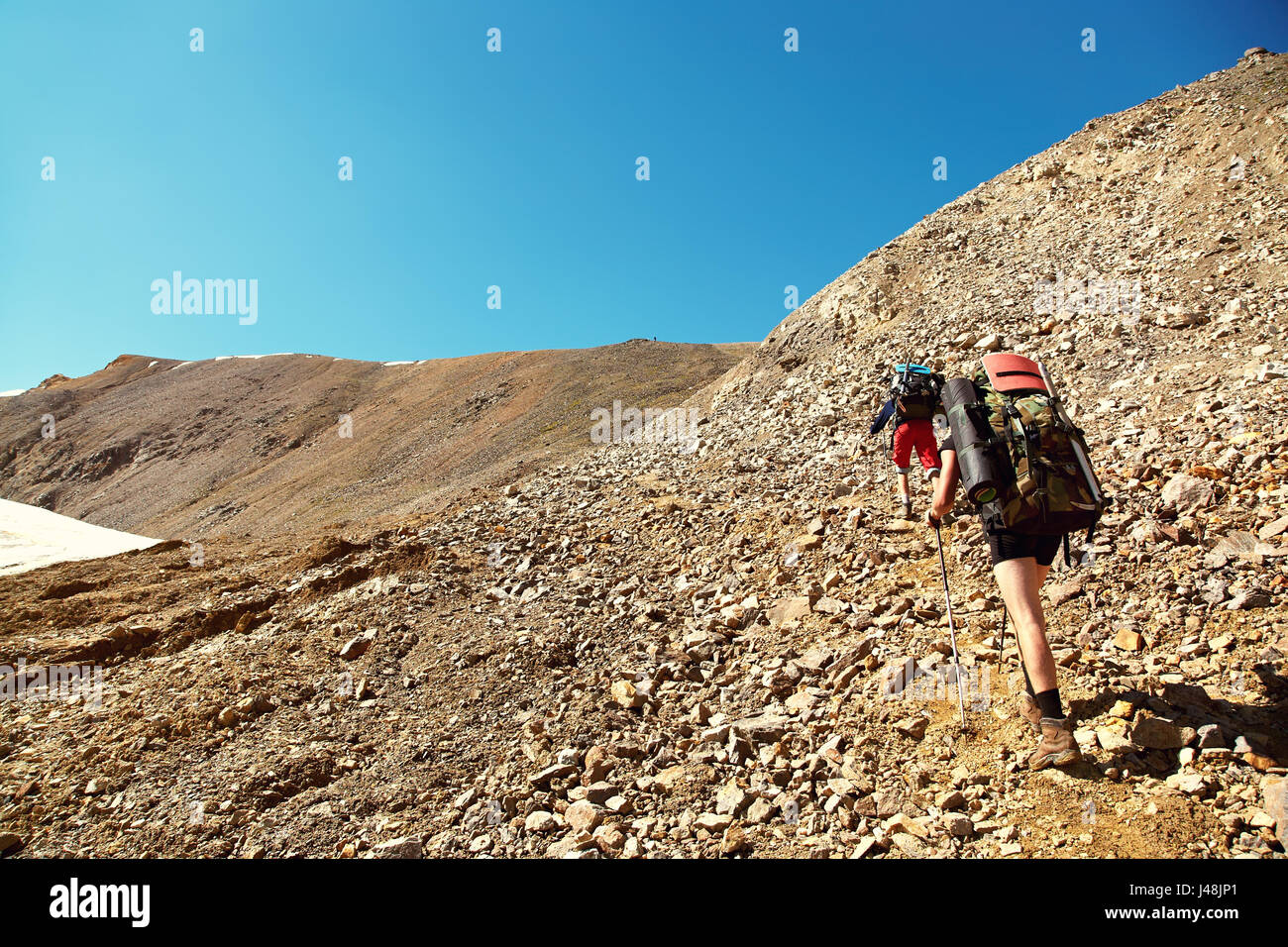 Group of hikers in the mountain Stock Photo - Alamy