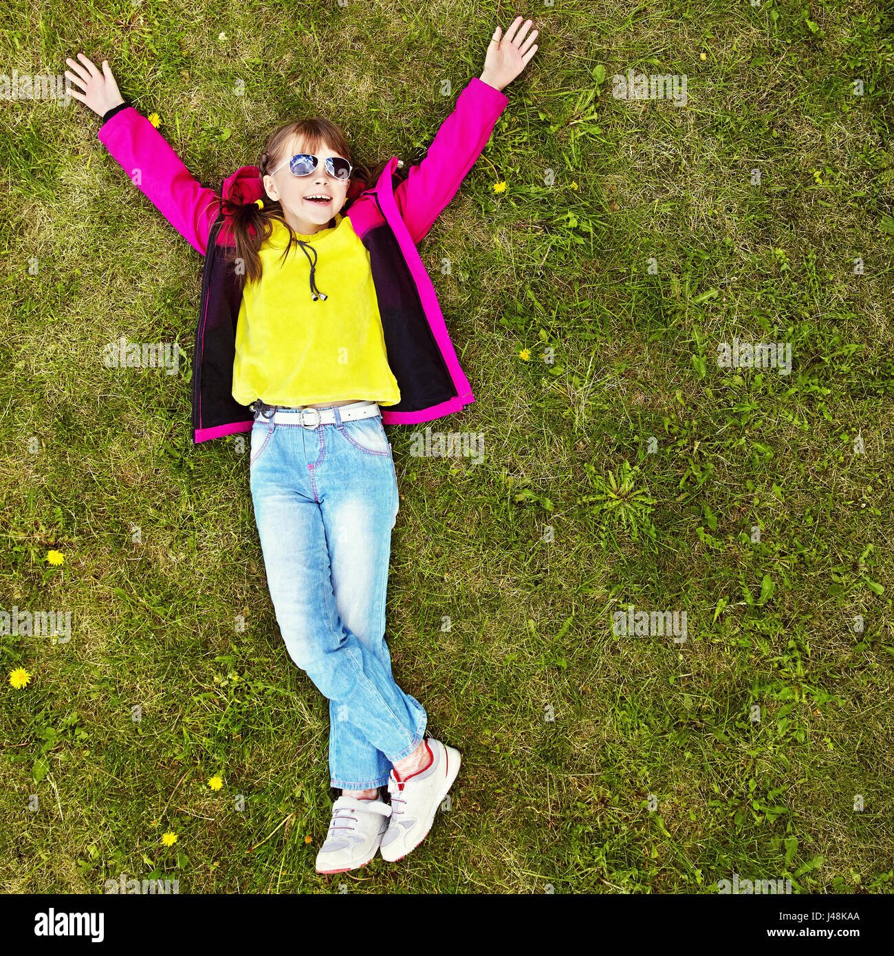 happy little girl in the park Stock Photo - Alamy