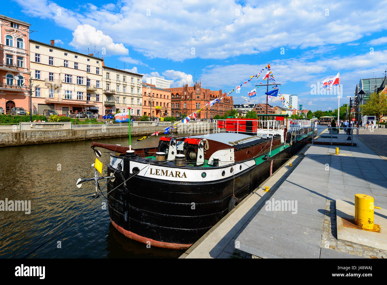 Bydgoszcz, Poland - May 8, 2016; Old Town and tourist boat - cruise ship on Brda River Stock Photo