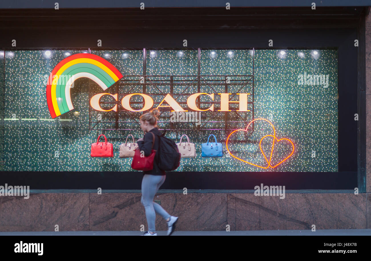 Macy's department store windows in New York promote Coach leather goods on Tuesday, May 9, 2017.  Luxury leather goods retailer Coach has bought handbag and women's apparel retailer Kate Spade in a $2.4 billion deal.  Macy's is scheduled to report first-quarter earnings on May 11. (© Richard B. Levine) Stock Photo