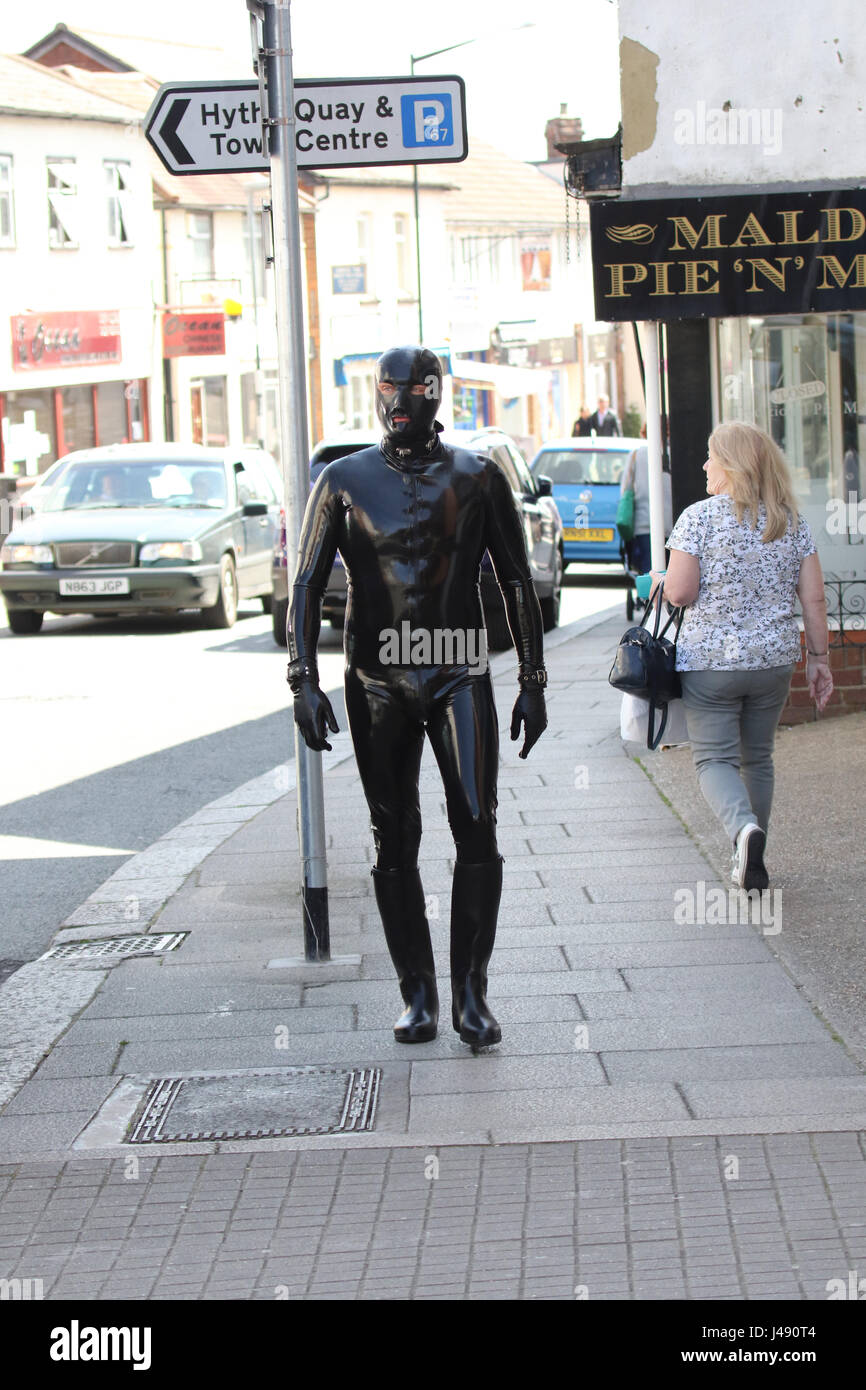 Maldon, Essex, UK. 10th May, 2017. The Gimp Man of Essex appears in the Essex town of Maldon. The mysterious character dressed from head to toe in black latex was seen walking up and down Maldon High Street. The Gimp Man donates a Â£1 to the mental health charity Mind for each selfie that is taken with him and their was no shortage of people who had their picture taken. Credit: David Johnson/Alamy Live News Stock Photo