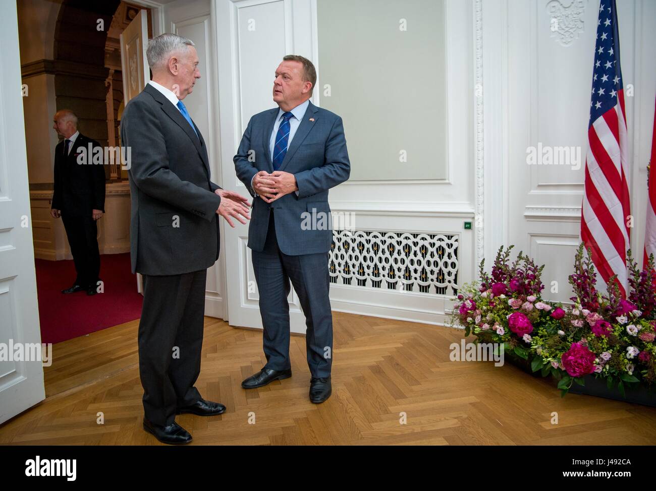 U.S. Secretary of Defense Jim Mattis, left, chats with Danish Prime Minister Lars Løkke Rasmussen prior to their bilateral meeting at the Christiansborg Palace May 9, 2017 in Copenhagen, Denmark. Stock Photo