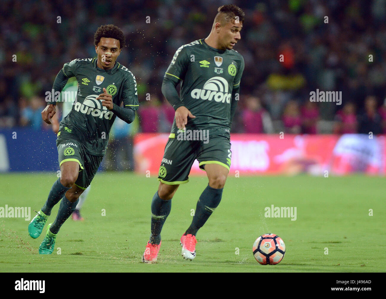 Medellin, Colombia. 10th May, 2017. Joao Pedro (r) and Osman JR of Chapecoense in action during the Recopa Sudamericana match between Atletico Nacional of Colombia and Chapecoense of Brazil in Medellin, Colombia, 10 May 2017. Photo: Luis Benavides/dpa/Alamy Live News Stock Photo