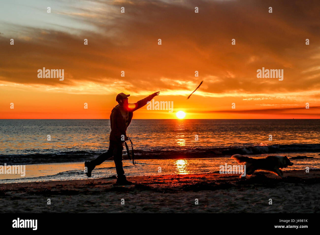 Adelaide, Australia. 11th May, 2017. A dramatic sunset over Adelaide beach creating vibrant colours of pink and orange hues Credit: amer ghazzal/Alamy Live News Stock Photo