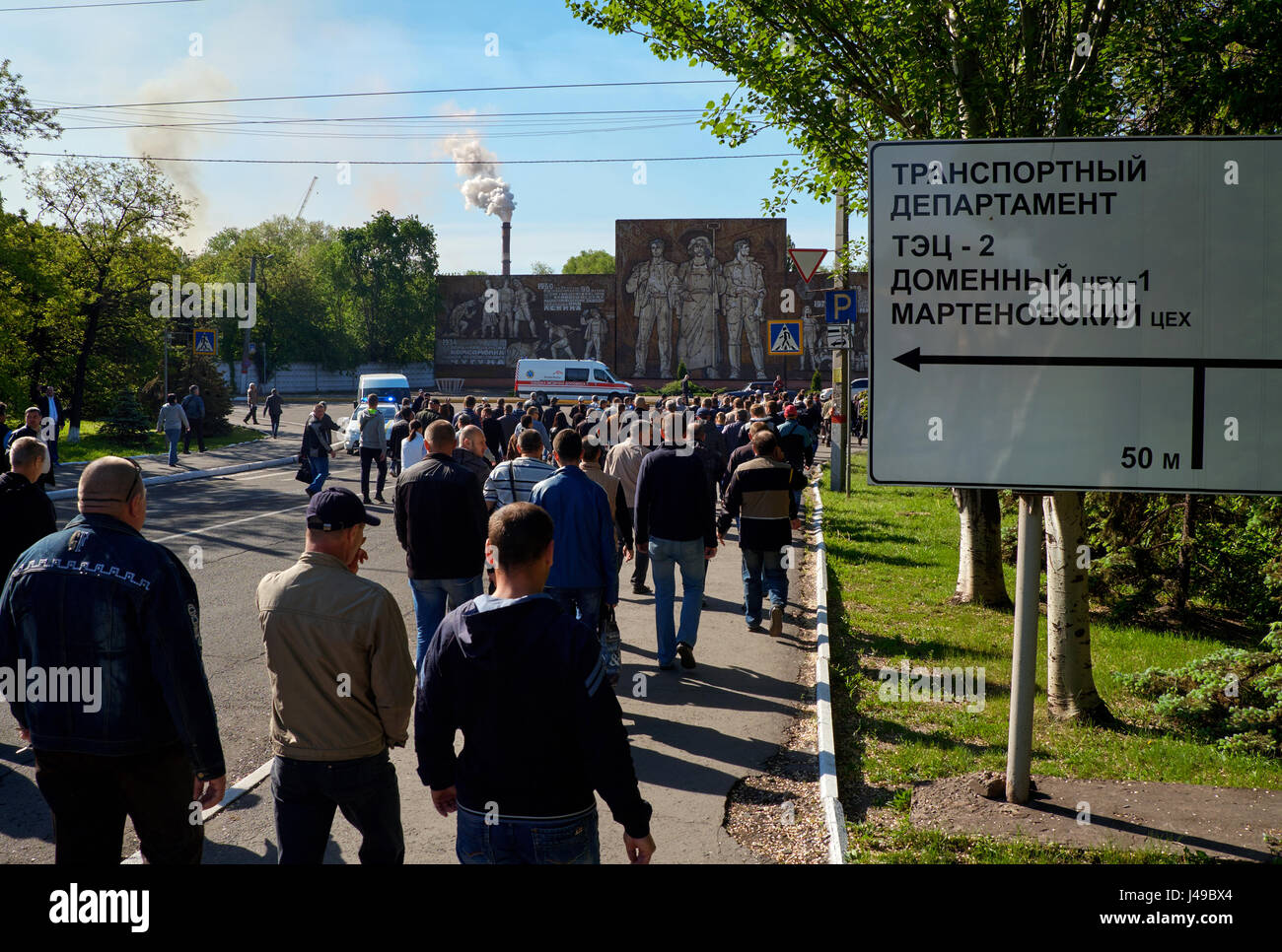 Kryvyi Rih, Ukraine. 11th May, 2017. Protesters going to the factory management building of JSC ArcelorMittal Kryvyi Rih during the meeting with main claim to Chief Executive Officer (CEO) Paramjit Kahlon to increase a minimum monthly salary up to equivalent of 1000 EURO. They demanded to improve social conditions and workplace safety too. Credit: Dmytro Aliokhin/Alamy Live News Stock Photo
