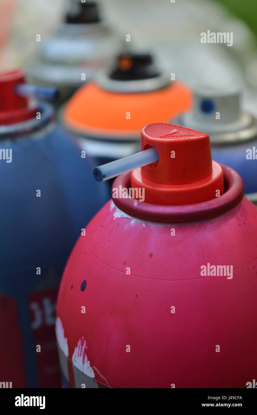 spray paint caps and cans of spray paint Stock Photo Alamy
