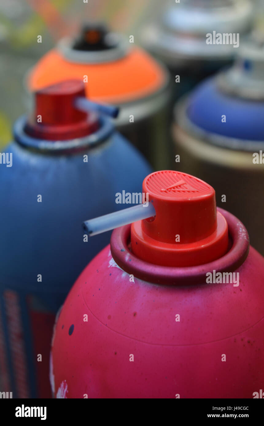 spray paint caps and cans of spray paint Stock Photo Alamy
