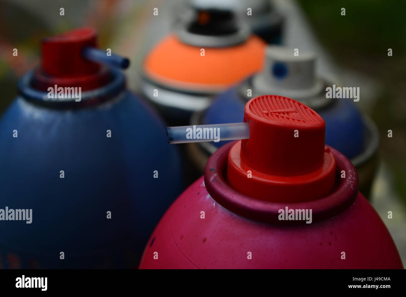 spray paint caps and cans of spray paint Stock Photo Alamy