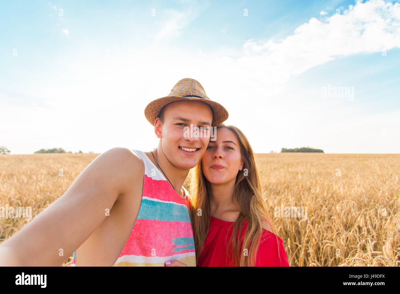 Young couple in love taking selfie Stock Photo - Alamy