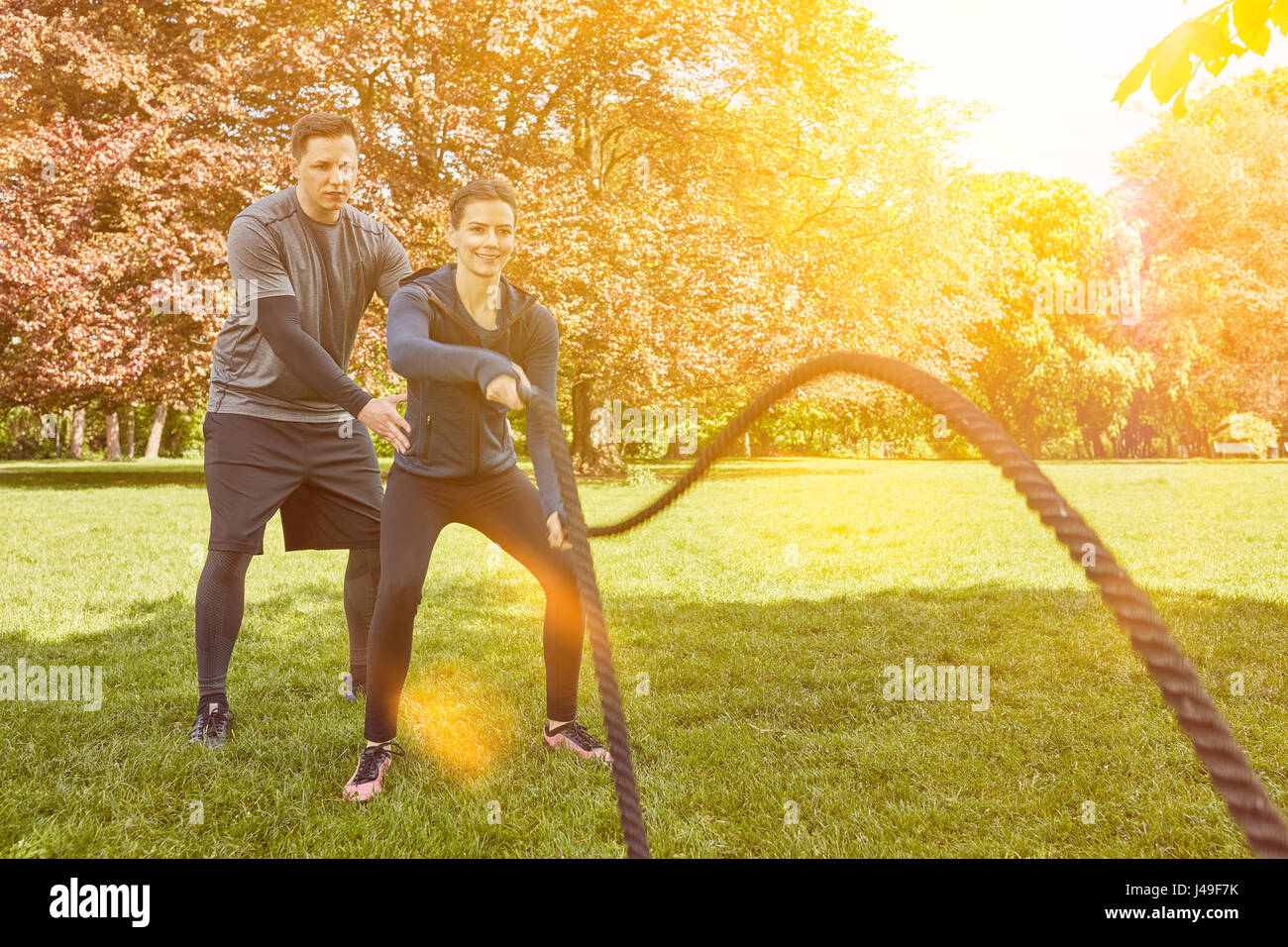 Fitness training with rope hi-res stock photography and images - Alamy