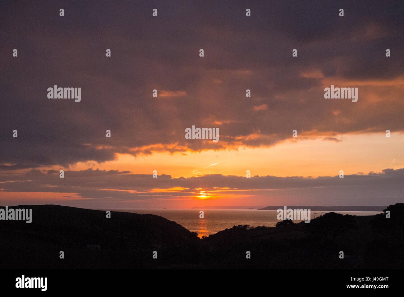 Sunset over the South Devon Coastline, Hope Cove, Kingsbridge, Devon, England, United Kingdom. Stock Photo