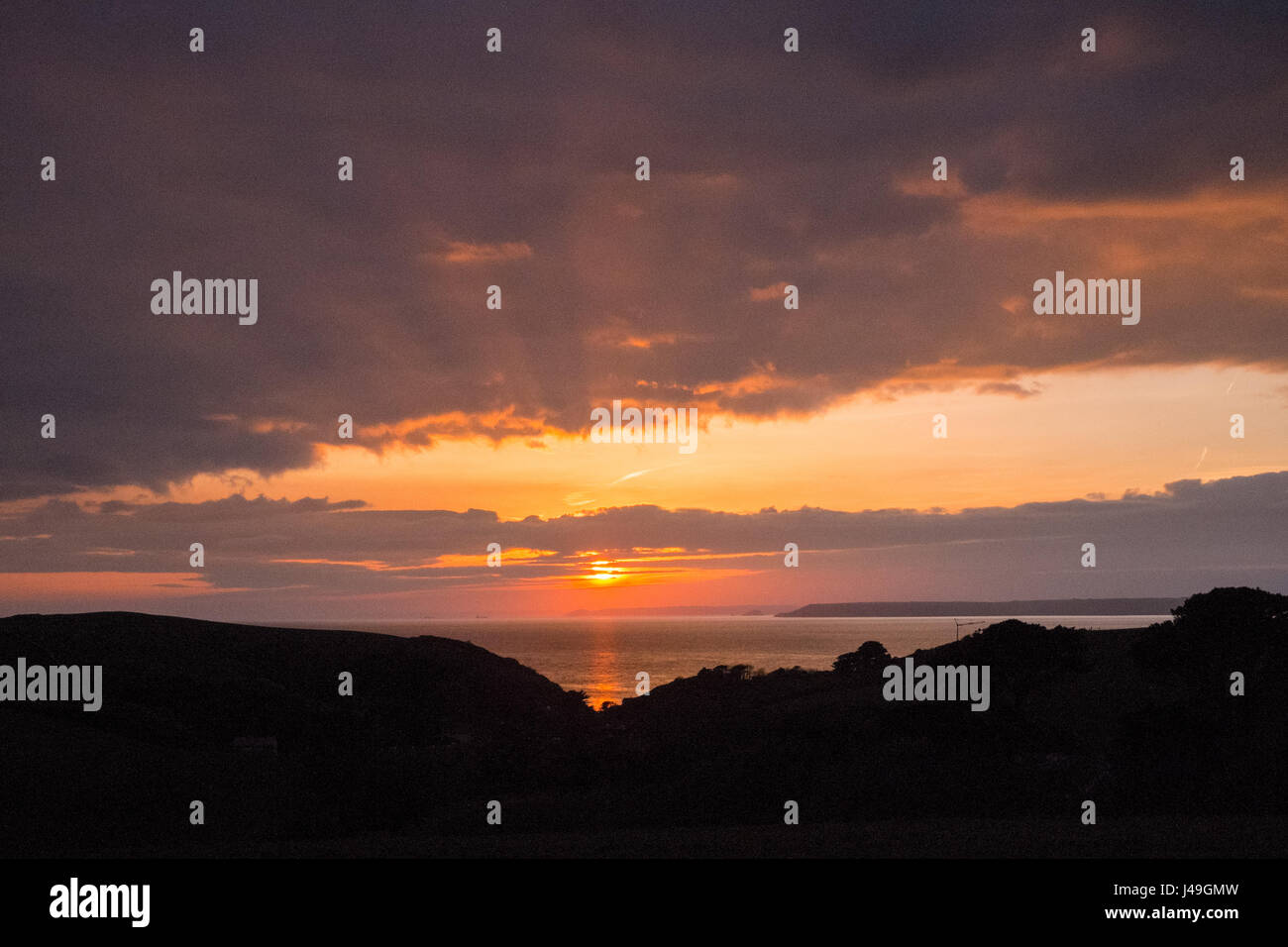 Sunset over the South Devon Coastline, Hope Cove, Kingsbridge, Devon, England, United Kingdom. Stock Photo