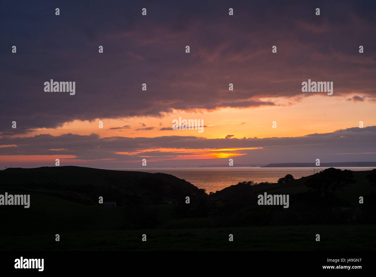 Sunset over the South Devon Coastline, Hope Cove, Kingsbridge, Devon, England, United Kingdom. Stock Photo